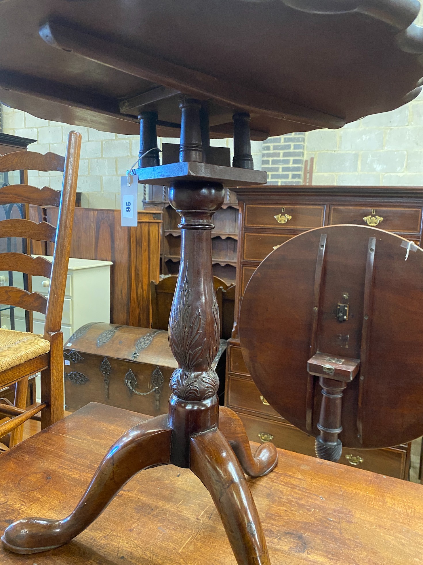 A George III and later circular mahogany tilt top tripod tea table, diameter 61cm, height 69cm